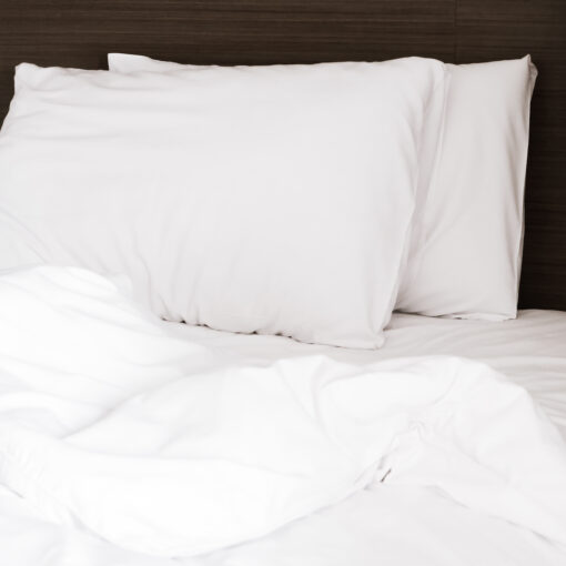 Bed Cover Apollo White Micro Fiber, made of micro fiber, comes in single, queen, and king sizes, with two pillows in a nice decorated room